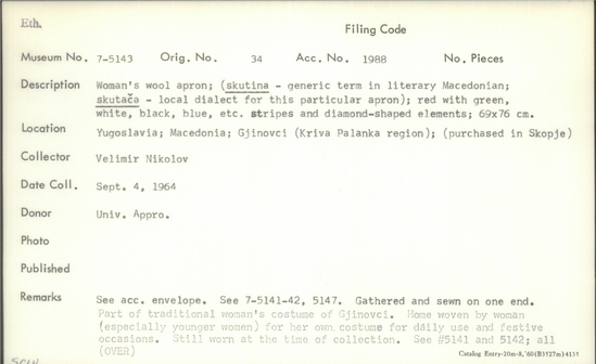 Documentation associated with Hearst Museum object titled Apron, accession number 7-5142, described as Woman's wool apron; (skutina - generic term in literary Macedonian; skutača - local dialect for this particular apron); red-orange with white, black, and gold diamond-shaped designs; 57 x 83 cm