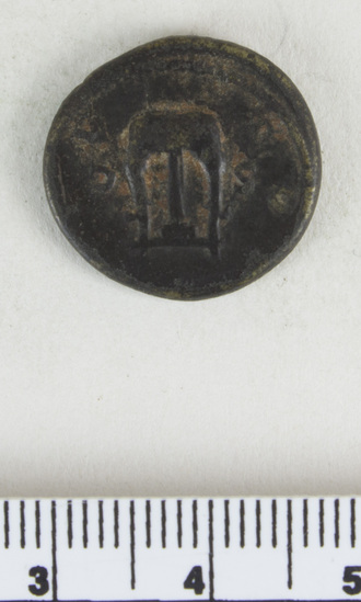 Hearst Museum object 14 of 14 titled Coin: æ semis, accession number 8-8133, described as Coin; Æ; aes grave; semis; Orichalcum. 3.751 grams. Obverse: Head of Hadrian, facing right. Reverse: S C flanking object.