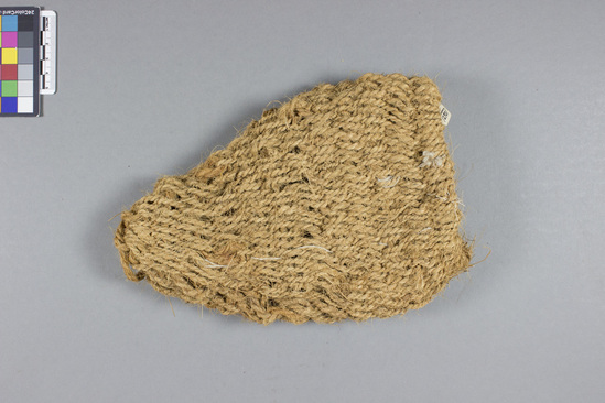 Hearst Museum object titled Mitt, accession number 9-12901, described as Mitt; massaging mitt, looped coconut fiber; length not including loop at distal end 23 cm.