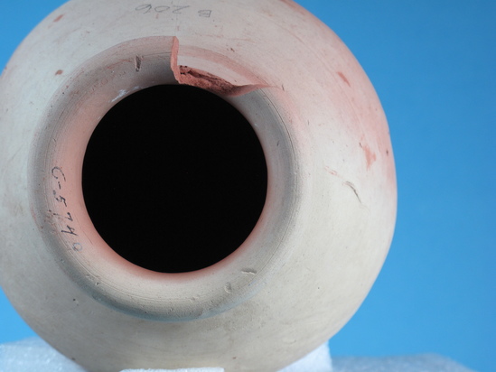 Hearst Museum object 17 of 85 titled Broken jar, accession number 6-5740, described as Pottery: smooth pinkish globose jar, rim broken