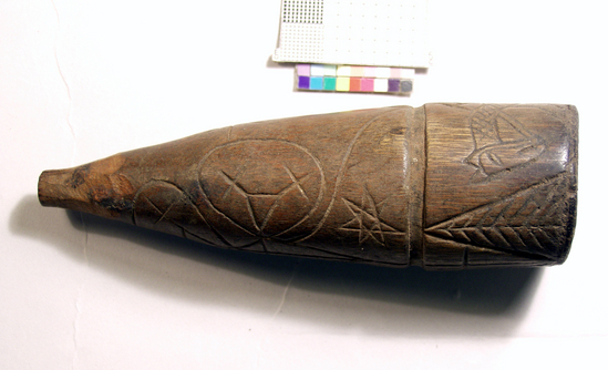 Hearst Museum object titled Pipe, accession number 16-7765, described as Pipe of jurema wood, decorated with crosses and stars and heavy incisions. At bowl end is figure of horse [?] and among other inscriptions the letter A, length 5 1/4”.