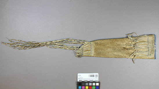 Hearst Museum object titled Scabbard, accession number 1-67361, described as Buckskin scabbard for 1-67360.