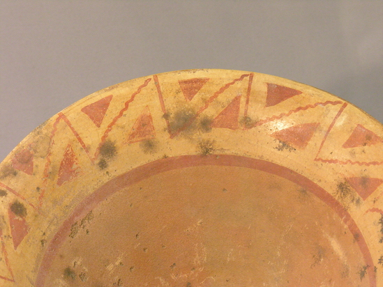 Hearst Museum object 2 of 3 titled Bowl, accession number 4-3166, described as Flaring flat-bottomed bowl containing trattles, triangles design on lip