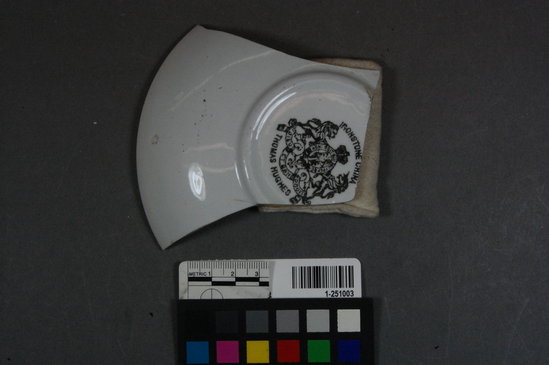 Hearst Museum object titled Plate fragment, accession number 1-251003, described as Ceramic plate fragment with maker's mark.