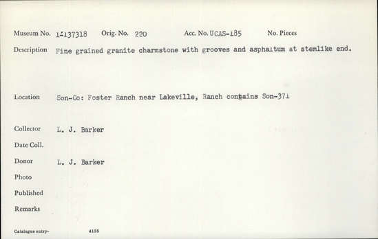 Documentation associated with Hearst Museum object titled Charmstone, accession number 1-137318, described as Fine grained, granite charmstone, with grooves and asphaltum at stemlike end.