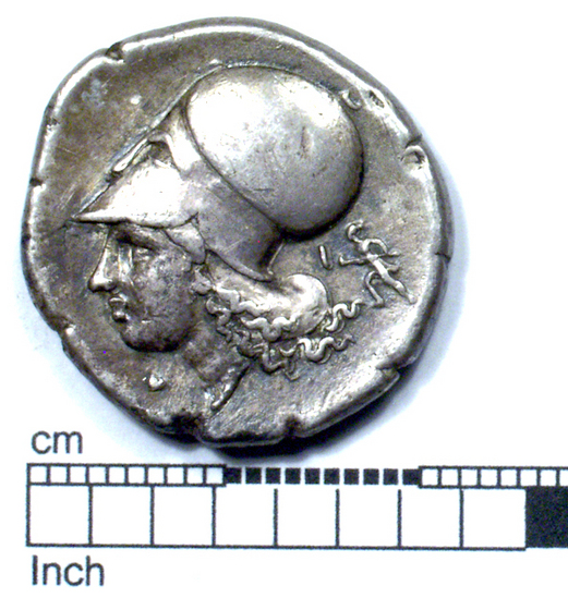 Hearst Museum object titled Coin: ar stater, accession number 8-5484, described as Coin; AR; Stater; Greek. 8.4312 grams, 23 mm. 400-338 BC. Corinth, Greece. Obverse: Pegasus with pointed wings flying l.; below, Ϙ. Reverse: Head of Pallas l. helmeted; in field, ΔΙ; to right, Artemis (Latin: Diana) running l., holding long torch with both hands. Remarks: "condition, excellent.