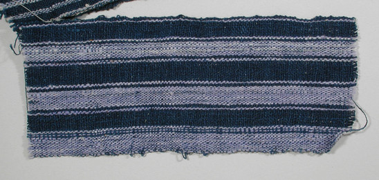 Hearst Museum object titled Textile fragment, accession number 5-11130, described as Textile sample (section of narrow band weaving): blue stripes alternating with purplish-white stripes flanked by narrow stripes of the same.