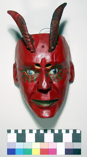 Hearst Museum object titled Devil mask, accession number 3-15596, described as Devil mask, carved wood and painted red with real goat's horns