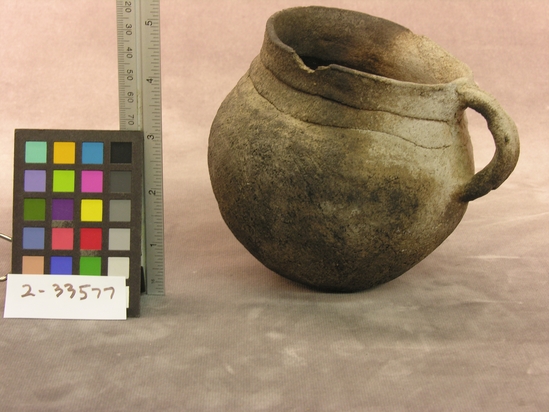 Hearst Museum object 2 of 2 titled Pottery, accession number 2-33577, described as Pottery vessel; Kana-a, neck banded; two coils joined for handles. 4 5/8 inches high.