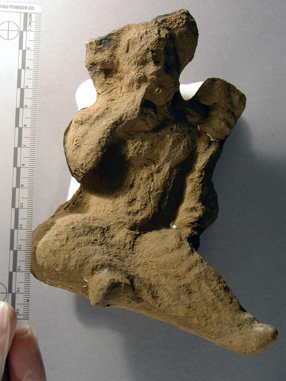 Broken harpocrates figurine