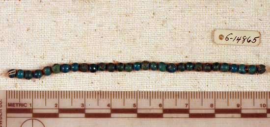 Hearst Museum object titled Beads, accession number 6-14865, described as String of blue spherical beads; length 10cm