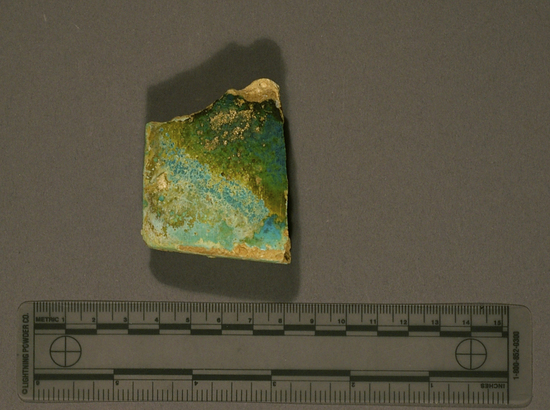 Hearst Museum object titled Tile fragment, accession number 6-7010, described as Corner fragment of a faience tile.