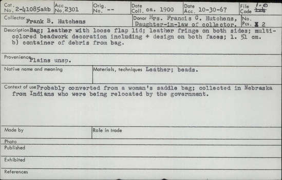 Documentation associated with Hearst Museum object titled Bag, accession number 2-41085a,b, described as Leather with loose flap lid; leather fringe on both sides; multicolored beadwork decoration including design on both faces. (b) container of debris from bag.