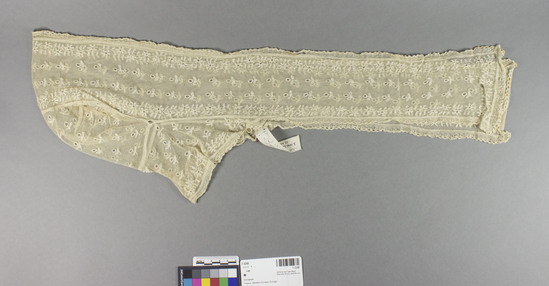 Hearst Museum object titled Cap, accession number 7-3248, described as cap w/hanging bands; cream lace. 23" long including bands