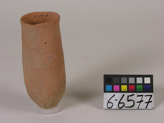 Hearst Museum object titled Beer cup, accession number 6-6577, described as Reddish pottery cup with a deep, pointed bottom; least diameter 6cm, greatest diameter 6.5cm, height 16cm