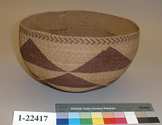 Hearst Museum object titled Basket, accession number 1-22417, described as Small, round. Diagonal twine. Brown decoration.