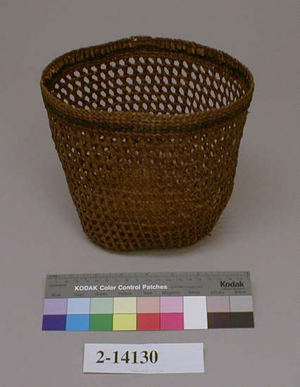 Hearst Museum object titled Basket, accession number 2-14130, described as Small openwork twined cedarbark basket with crossed warps; checkerweave base.