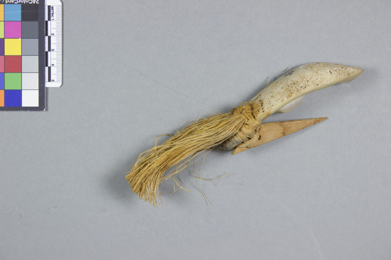 Hearst Museum object titled Fishhook and fishing lure, accession number 11-607, described as Pearl fish-hook; fibre beard, dyed yellow.