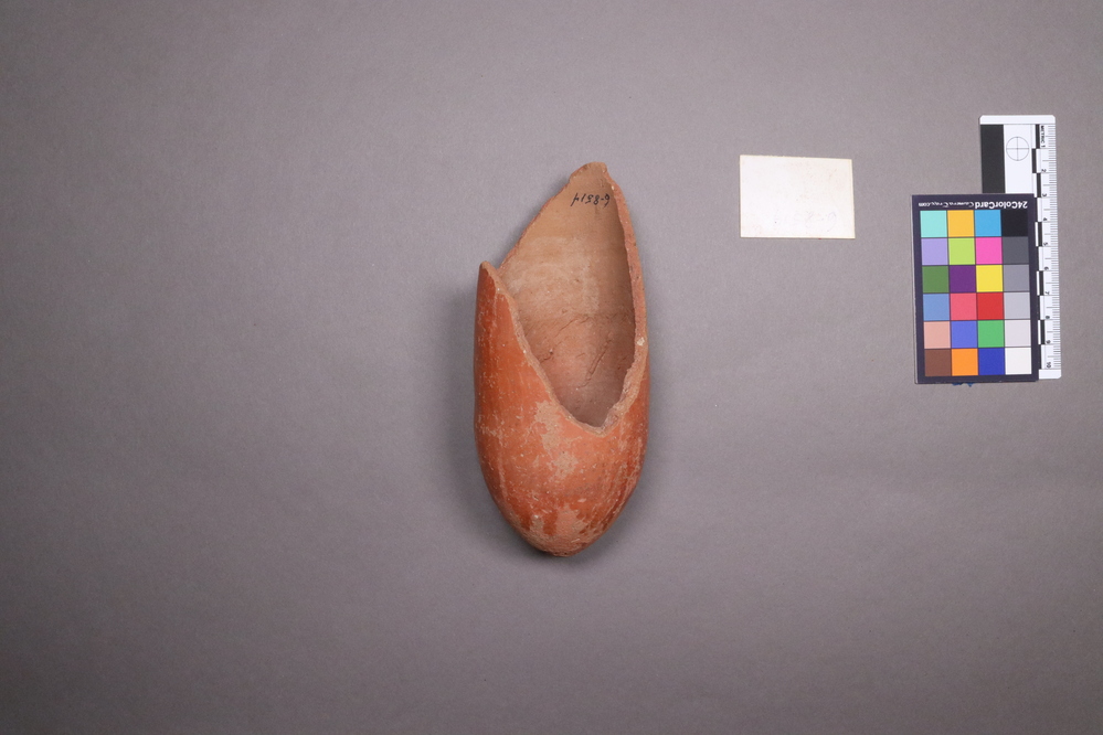 Hearst Museum object titled Incomplete beer cup, accession number 6-8514, described as Pottery: deep red cup, part missing, Greatest Diameter 6- Height 15 cm.