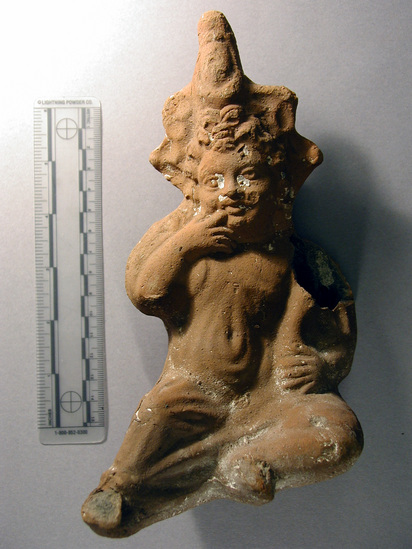 Hearst Museum object titled Broken harpocrates figurine, accession number 6-20330, described as Pottery Harpocrates, shoulder broken. Roman town.