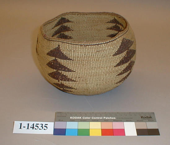 Hearst Museum object titled Basket, accession number 1-14535, described as White, brown bottom. Design of vertical rows of triangles. Label on basket reads: "Shasta Indian`s work".