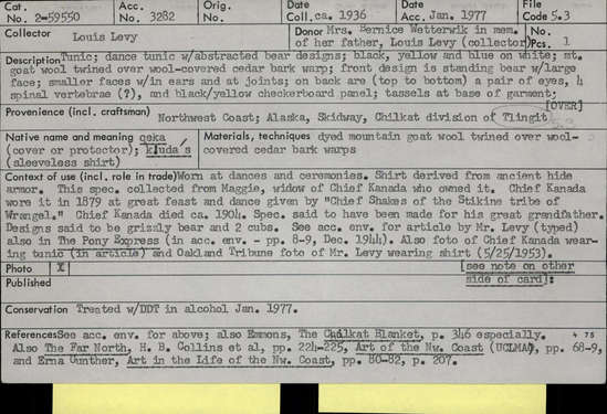 Documentation associated with Hearst Museum object titled Tunic, accession number 2-59550, described as Abstracted bear designs; black, yellow and blue on white; dyed mountain goat wool twined over wool-covered cedar bark warp; front design is standing bear with large face; smaller faces within ears and at joints; on back are (top to bottom) a pair of eyes, 4 spinal vertebrae?, and black/yellow checkerboard panel; tassels at base of garment; one side of tunic is sewn almost closed, other side has 3 pair buckskin ties; drawstring at neck. Designs said to be grizzly bear and 2 cubs.