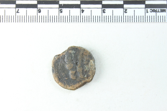 Hearst Museum object titled Coin: æ, accession number 6-22447, described as Diademed head of Zeus Ammon, r. central hole