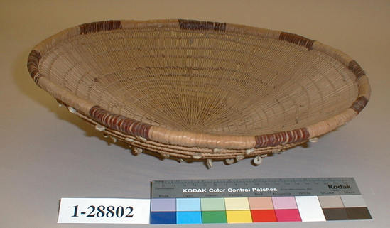 Hearst Museum object 1 of 3 titled Basket, accession number 1-28802, described as Openwork lattice tray. Red and white wrapping on rim, exterior clamshell beads.