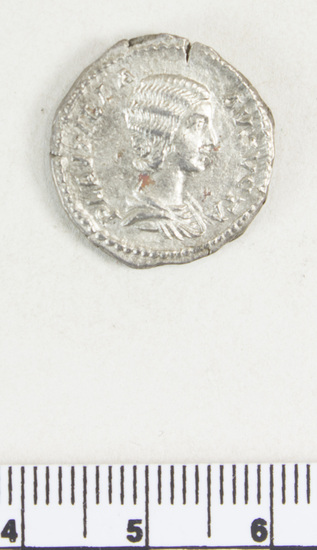 Hearst Museum object 4 of 8 titled Coin: ar denarius, accession number 8-4352, described as Coin; AR; Denarius; Roman. 3.23 grams, 19 mm. Plautilla, 202-205 AD. Rome, Italy. Obverse: PLATVTILLA AVGVSTA Head right. Reverse: VENVS VICTORIX Venus (Greek: Aphrodite) left with palm and shield; cupid (Greek: Eros) at her feet.