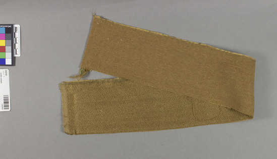 Hearst Museum object titled Textile sample, accession number 2-62243, described as Strip; silk?, weft faced twill, 2 sets of wefts, brown, 27 1/4 inches x 4 inches