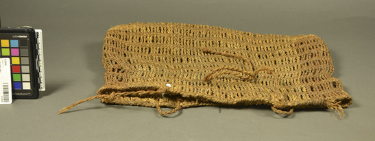 Hearst Museum object titled Basket, ijiko, accession number 9-22949, described as A woven basket made of rice straw, worn at the waist.