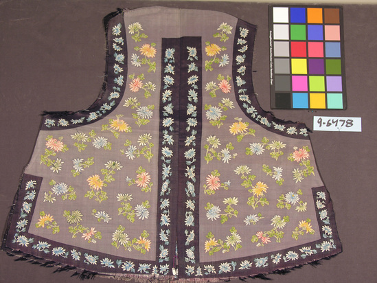 Hearst Museum object titled Vest, accession number 9-5478, described as Vest; unfinished; grey silk to pasty; multicolor floral; K’OSSU; gilt paper; dark blue edging; 27  1/2 inches long.