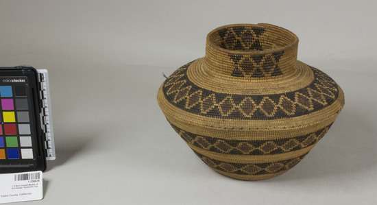 Hearst Museum object 3 of 3 titled Basket, accession number 1-230678, described as 2 rattlesnake bands on body, one on shoulder (red diamond, outlined in straw-colored ground on encircling black band); coiled, necked, jar-shaped. Minute traces of feathers; 2 areas of red diamonds and black triangles on neck. Made of redbud and bracken fern.