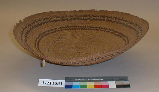 Hearst Museum object titled Winnowing tray, accession number 1-211531, described as Twined. Designs in redbud.