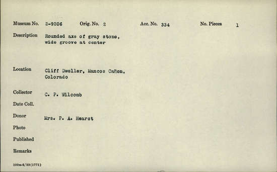 Documentation associated with Hearst Museum object titled Axe, accession number 2-9206, described as Rounded, of gray stone, wide groove at center.