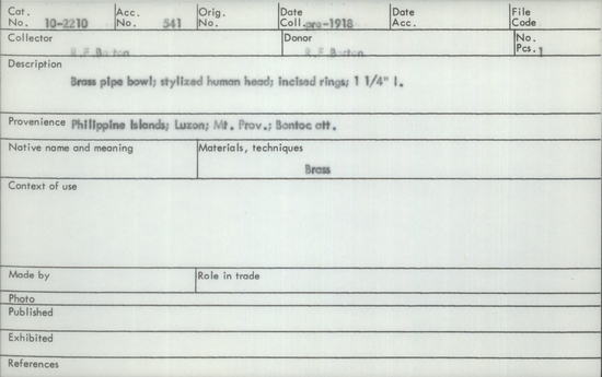 Documentation associated with Hearst Museum object titled Pipe bowl, accession number 10-2210, described as Brass pipe bowl, stylized human head, incised rings, 1¼ inches long