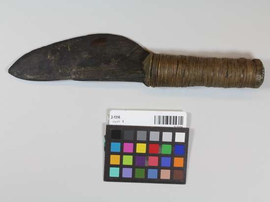 Hearst Museum object titled Knife, accession number 2-1316, described as Slate blade, single edged, wood handle with root wrappers.