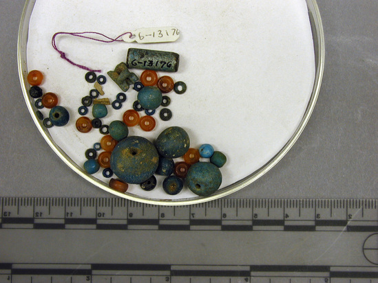 Hearst Museum object 8 of 10 titled Beads, accession number 6-13176, described as Beads: 15 green glaze, various, 12 carnelian discs, 26 green. [inv.: ball and ring beads, original object count: 53?]