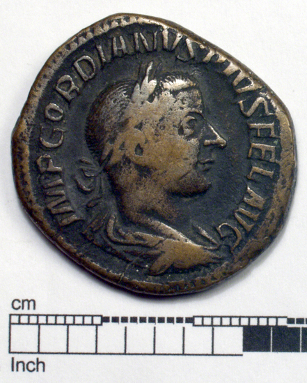 Hearst Museum object 1 of 8 titled Coin: æ sestertius, accession number 8-5921, described as Coin: Sestertius; Æ; Gordianus.Pius - 17.17 grams. Rome, 240-244 AD. Obverse: IMP GORDIANVS PIVS FEL AVG - bust facing right, laureate, draped, cuirassed. Reverse: FELICI T TEMPOR, SC - Felicitas standing holding long caduceus and cornucopiae.