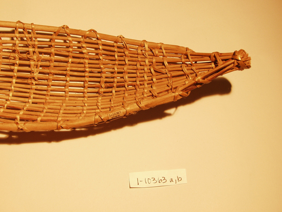 Hearst Museum object 4 of 8 titled Racket, accession number 1-10363a,b, described as Basket racket;  warp is Willow (Salix), weft is Maple (Acer macrophyllum). Open plain twined, peeled shoots, with no decoration.