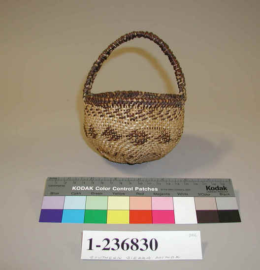 Hearst Museum object titled Miniature basket, accession number 1-236830, described as Twined miniature gathering basket with handle, design of red diamonds around the middle, bands of tick marks. Diagonal twining; split sumac shoots and split redsbud shoot on peeled shoot warp.