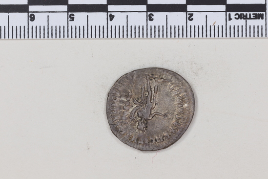 Hearst Museum object 3 of 8 titled Coin: ar antoninianus, accession number 8-4370, described as Coin; Billon; Antoninianus; Roman. 4.22 grams, 23 mm. Trajan Decius, 249-251 AD. Obverse: IMP TRAIANV DECIVS AVG, bust r. radiate. Reverse: GENIVS EXERCITVS ILLVRICIANI, genius standing l., military standard at r.