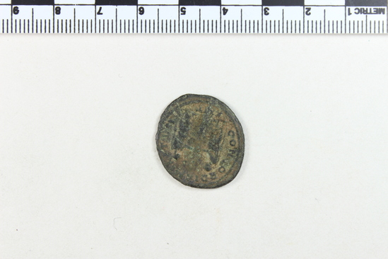 Hearst Museum object 5 of 8 titled Coin: billon antoninianus, accession number 8-6012, described as Coin: Antoninianus; AR [?], Æ; Aurelianus - 3.03 grams. Obverse: IMP C AVRELIANVS AVG - Bust facing right radiate, cuirassed. Reverse: CONCORDIA MILITVM -  Emperor and Concordia clasping hands, [untranscribable symbols].