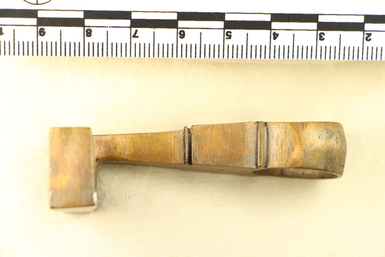 Hearst Museum object titled Key, accession number 8-5343, described as Key bronze handle, bronze shank and beard 60 mm