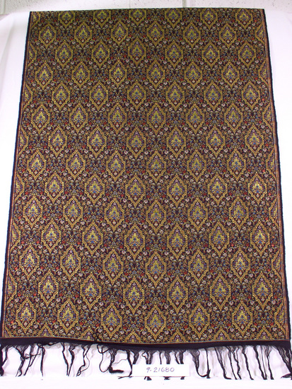 Hearst Museum object titled Shawl, accession number 9-21680, described as Shawl; L=188 cm x W=75 cm including fringe; black cotton warp; supplemental silk weft with gold, silver, brown-red, and turquoise design with diamond shaped lozenges & floral background; ; 3.5 cm black border on all sides; 7.5cm cut fringe on one end and 9.5cm uncut fringe at other end.