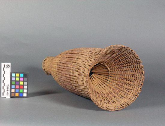 Hearst Museum object titled Trap, accession number 10-1952, described as Basketry fish trap, bell shape, brown, natural