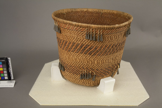 Hearst Museum object 2 of 2 titled Burden basket, accession number 2-18296, described as Diagonal twined, tin bells.