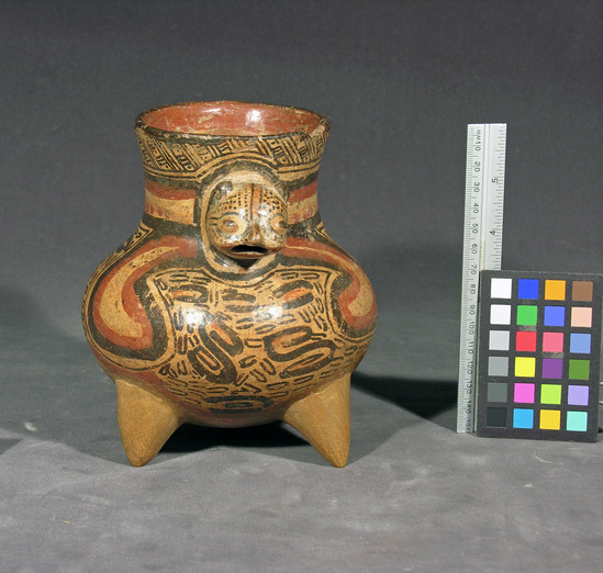 Hearst Museum object titled Effigy bowl, accession number 3-26772, described as Effigy bowl; polychrome tripod rattle effigy bowl with modeled jaguar head, chip on rim. 16 cm high.