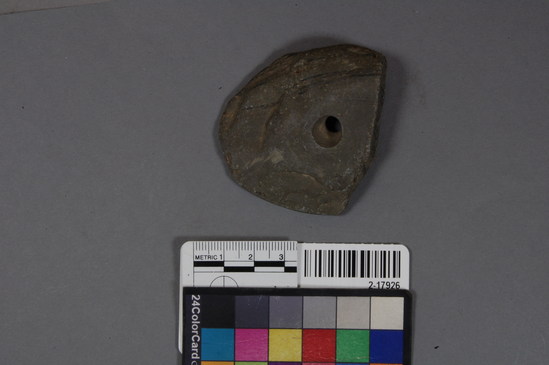 Hearst Museum object titled Bannerstone, accession number 2-17926, described as Perforated banner stone of banded slate, incomplete