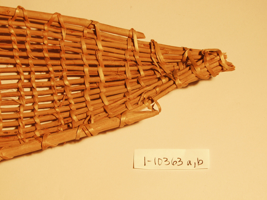 Hearst Museum object 8 of 8 titled Racket, accession number 1-10363a,b, described as Basket racket;  warp is Willow (Salix), weft is Maple (Acer macrophyllum). Open plain twined, peeled shoots, with no decoration.